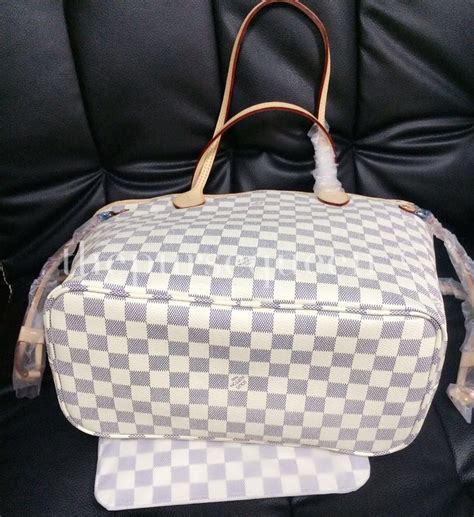 how to spot a fake louis vuitton damier purse|louis vuitton damier collection.